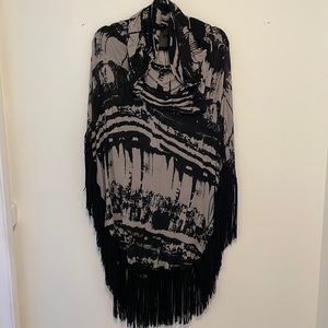 Woman’s  poncho.   Lightweight